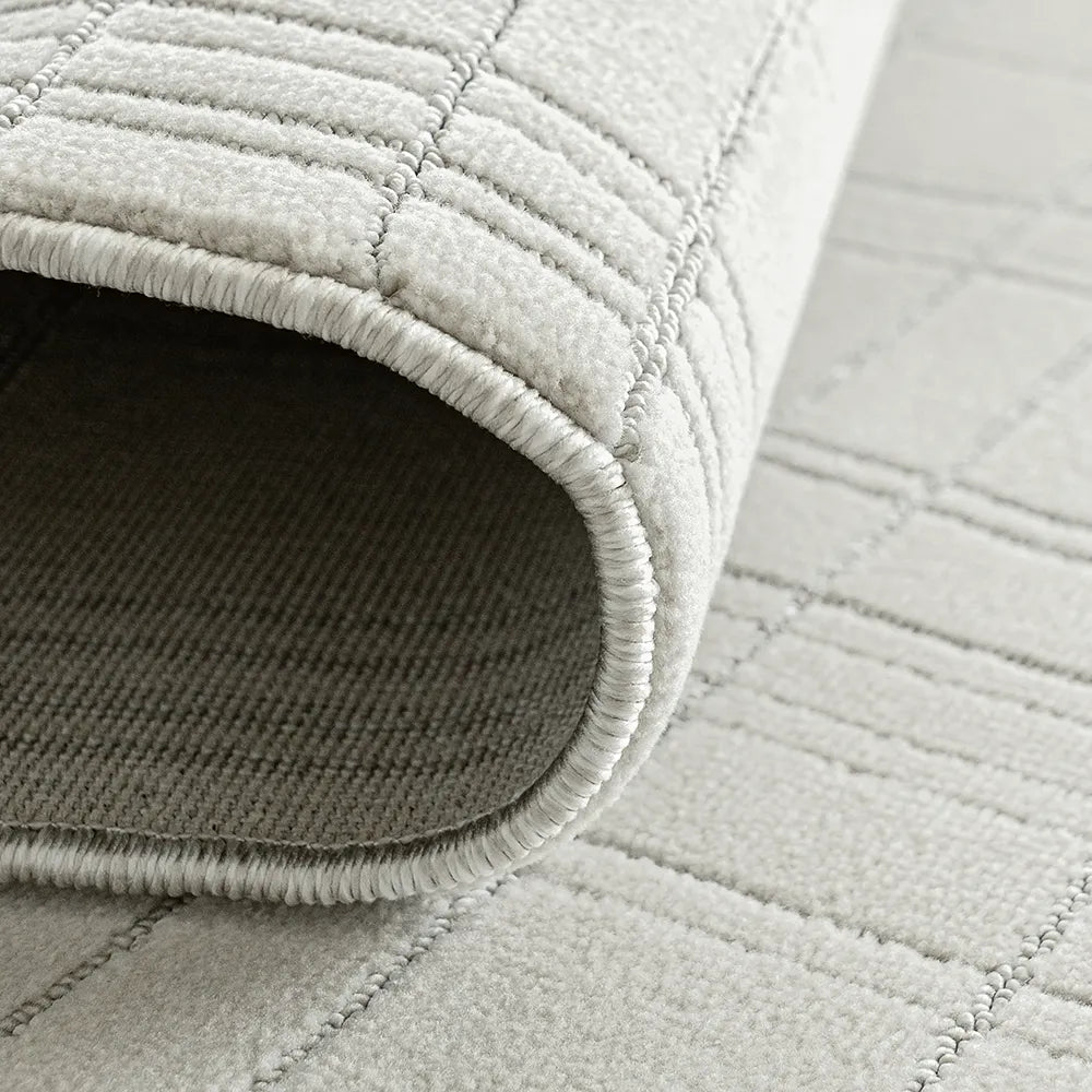 Corvin Sandy - Rectangular Grid Patterned Ivory Grey Carpet
| Knot Home